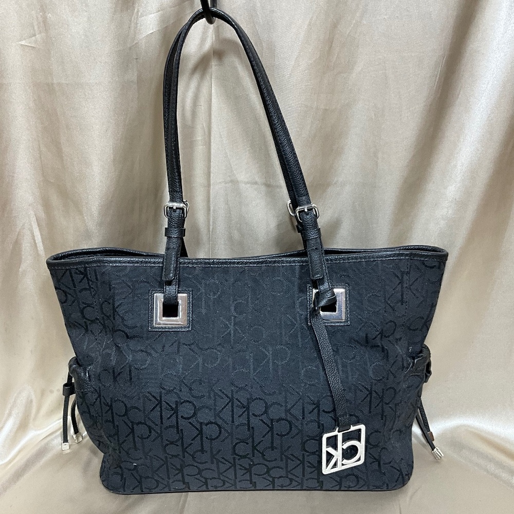Calvin Klein black tote black tote bag.     3-H5Ha